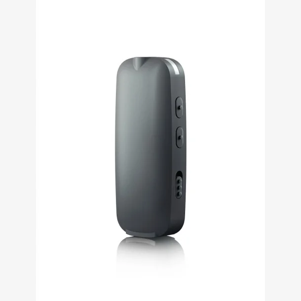 The Unitron uMic, a sleek gray rectangular device with rounded edges, two buttons, and a side port, stands upright on a reflective surface against a white background.