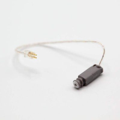 The Easywear wired RIC (S-receiver) hearing aid receiver, featuring a thin clear wire and gray earpiece, is displayed on a plain white background.