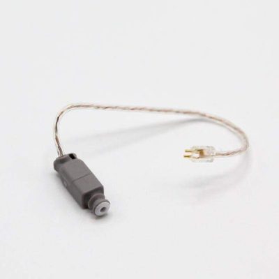 A compact gray Easywear wired RIC (M-Receiver) electronic component with an attached wire and clear three-pronged connector is shown on a white background.